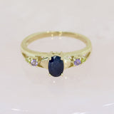 Pre Owned 9ct Yellow Gold Oval Sapphire Ring with Amethyst & Peridot Shoulders