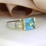 Pre Owned 9ct Blue Topaz Ring with Diamond Set Shoulders