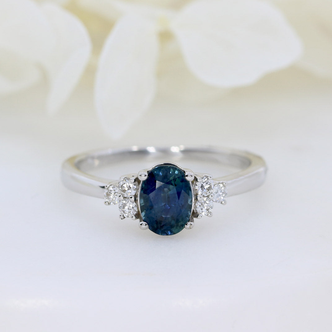 Pre Owned 18ct White Gold Oval Sapphire Ring with Diamond Cluster Shoulders