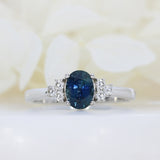 Pre Owned 18ct White Gold Oval Sapphire Ring with Diamond Cluster Shoulders