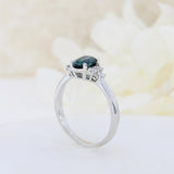 Pre Owned 18ct White Gold Oval Sapphire Ring with Diamond Cluster Shoulders