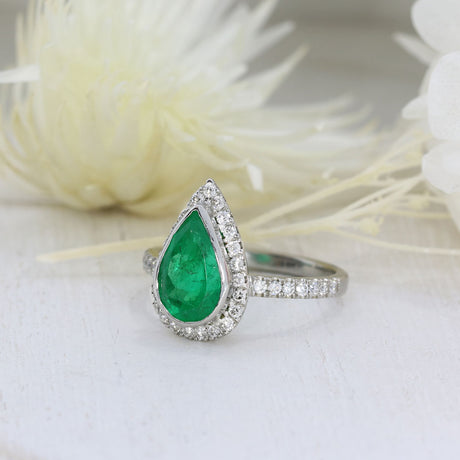 Pre Owned Platinum Pear Shape Emerald & Diamond Halo