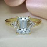 Pre Owned 9ct Yellow Gold Oblong Aquamarine Ring with Diamond Set Shoulders