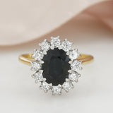 Pre Owned 18ct Yellow Gold Claw Set Oval Sapphire & Round Diamond Cluster Ring