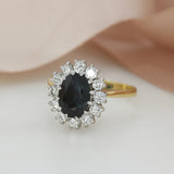 Pre Owned 18ct Yellow Gold Claw Set Oval Sapphire & Round Diamond Cluster Ring