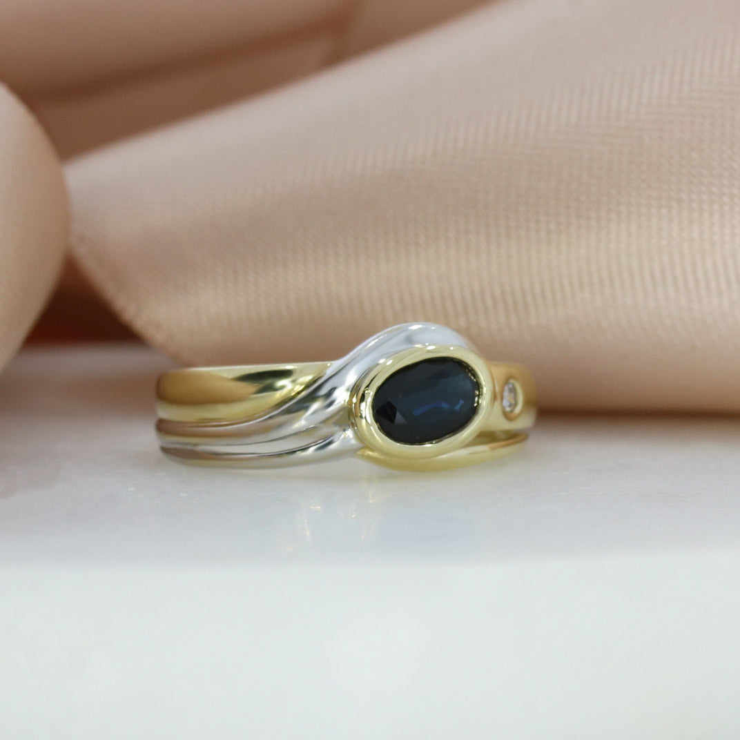 Pre Owned 9ct Yellow Gold Rubover Set Oval Sapphire & Diamond Ring