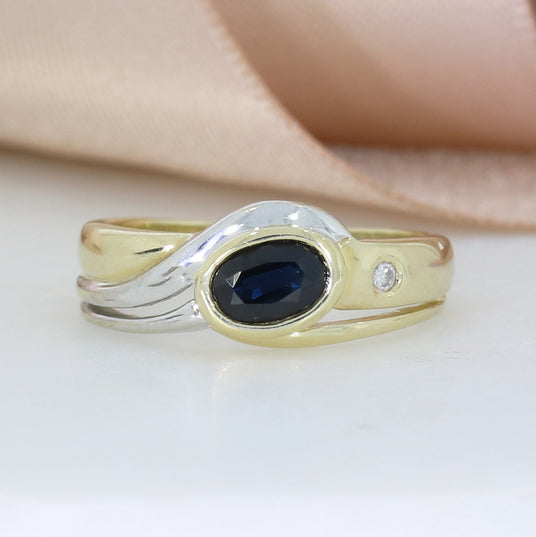 Pre Owned 9ct Yellow Gold Rubover Set Oval Sapphire & Diamond Ring