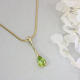 Pre Owned 9ct Gold Peridot long Drop Pendant with 18" Chain