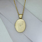 Pre Owned 9ct Gold Oval Locket with Star Set Diamond & 25" Chain