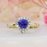 Pre Owned 18ct Yellow Gold Trillian Cut Tanzanite & Round Diamond Halo Ring