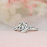 Pre Owned Platinum Natural Diamond Solitaire Ring with Channel Set Shoulders