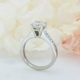 Pre Owned Platinum Natural Diamond Solitaire Ring with Channel Set Shoulders