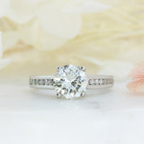 Pre Owned Platinum Natural Diamond Solitaire Ring with Channel Set Shoulders