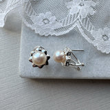 Silver flower earring with pearl centre