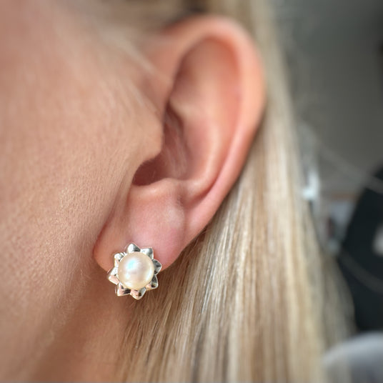 Silver flower earring with pearl centre