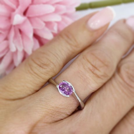 Pre Owned 18ct White Gold Oval Pink Sapphire Cross Over Ring