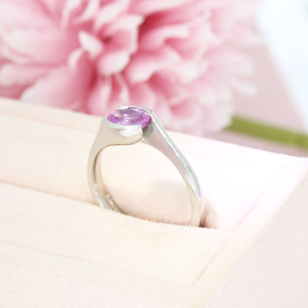 Pre Owned 18ct White Gold Oval Pink Sapphire Cross Over Ring