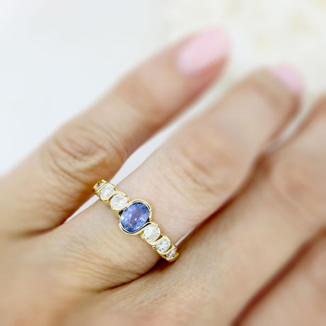 18ct Yellow Oval Sapphire Ring With 3 Graduating Diamonds On Each Side