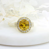 Pre Owned 18ct Gold 8.80ct Yellow Sapphire & Diamond Halo Ring