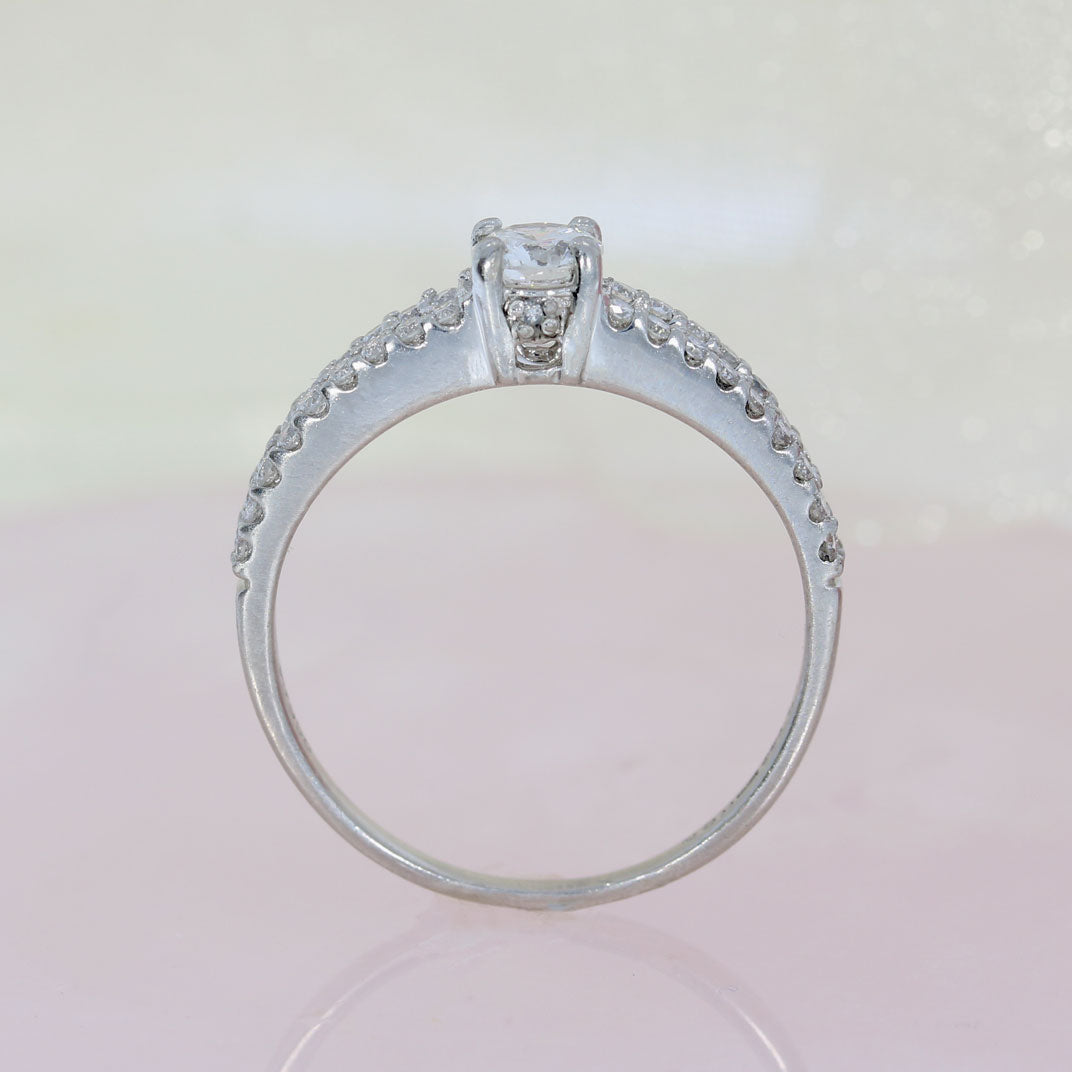 Pre Owned Certified Platinum Diamond Solitaire Ring with Split Diamond Set Shoulders 0.63ct