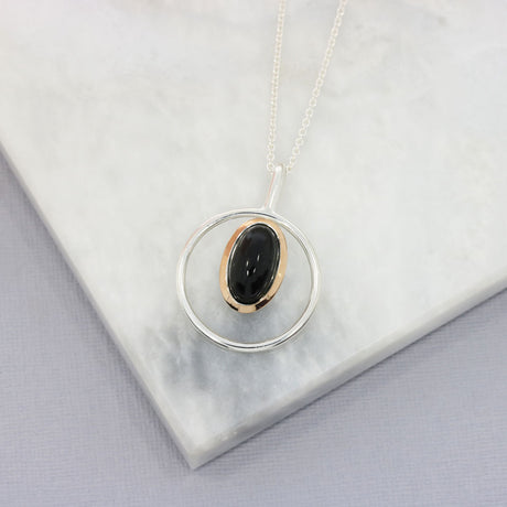 Silver Round Open Pendant Set With Black Onyx & Rose Gold Detail