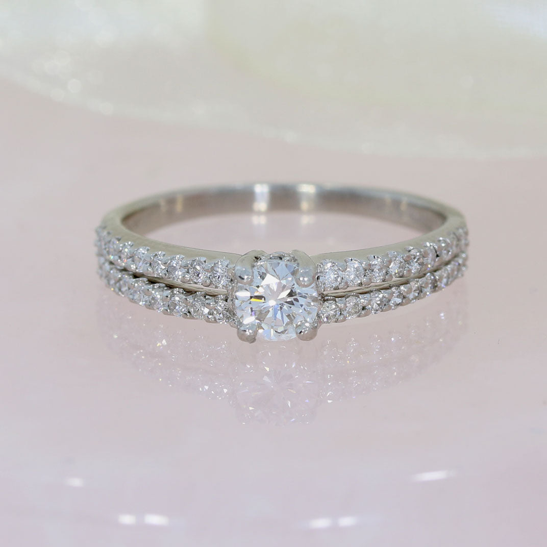 Pre Owned Certified Platinum Diamond Solitaire Ring with Split Diamond Set Shoulders 0.63ct