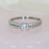 Pre Owned Certified Platinum Diamond Solitaire Ring with Split Diamond Set Shoulders 0.63ct