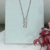 18ct White Gold 3 Stone Diamond Pendant on an 18ct White Gold Chain