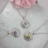 Silver Fancy Pendant With Pear Shape Blue Topaz & Chain