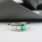 18ct White Gold Emerald & Channel Set Baguette Diamond Ring