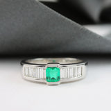 18ct White Gold Emerald & Channel Set Baguette Diamond Ring