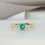 18ct Yellow Gold Oval Emerald & Round Diamond Three Stone Ring