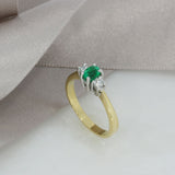 18ct Yellow Gold Oval Emerald & Round Diamond Three Stone Ring