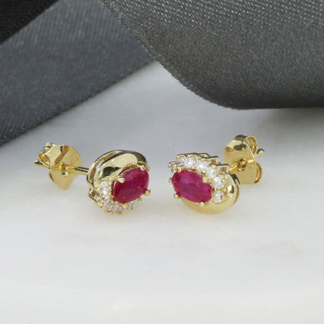 9ct Yellow Gold Oval Ruby Earrings With Claw Set Diamonds