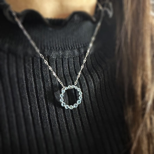 Pre Owned 9ct White Gold Blue Topaz Circle Pendant on a White Gold Chain