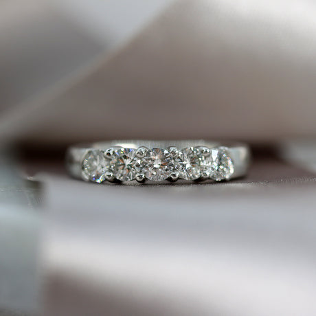 Platinum 5 stone claw set diamond eternity ring  .96ct