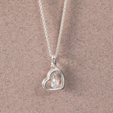 Silver Open Heart Pendant With Suspended CZ