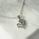 Silver Fancy Swirl Open Heart Pendant With CZ's