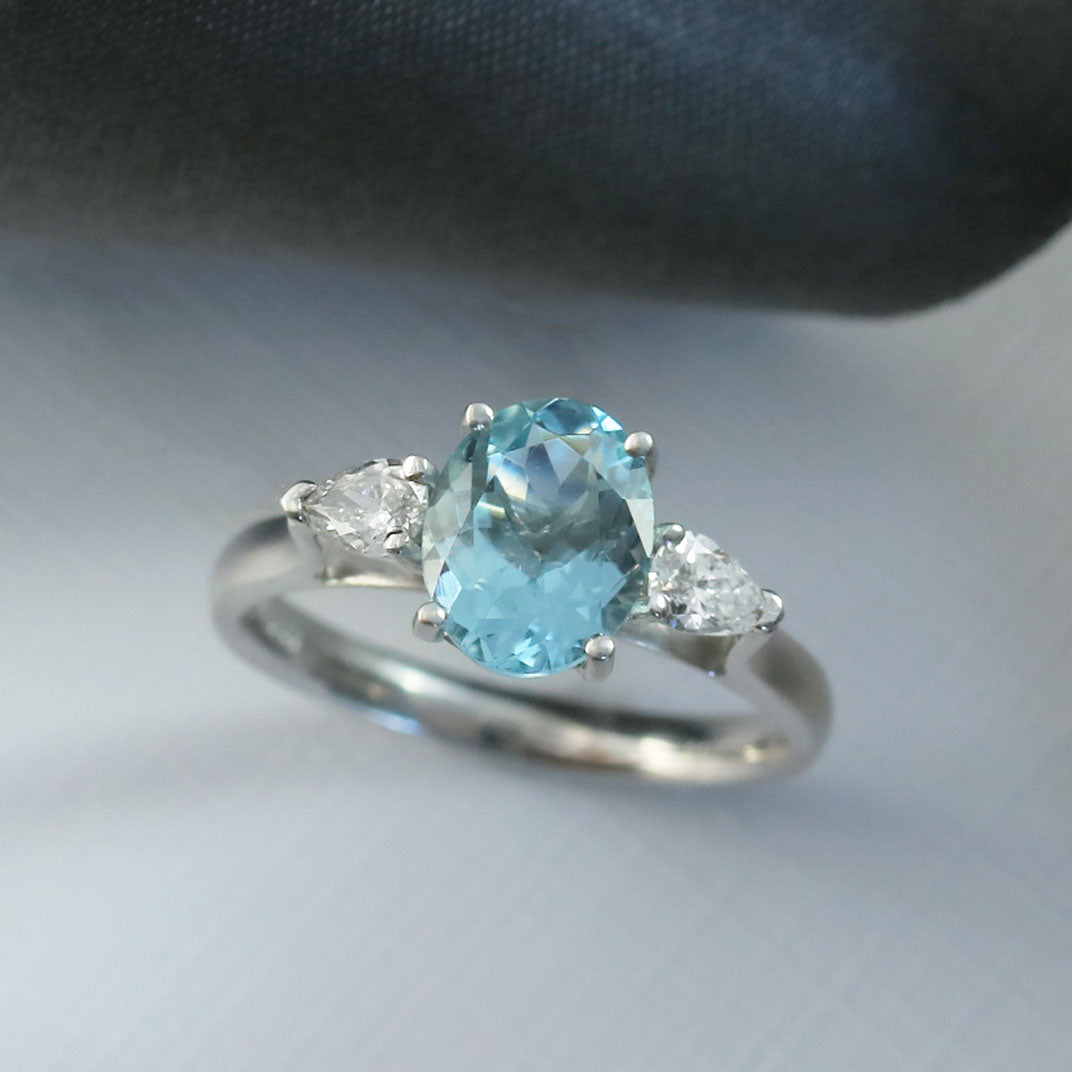 18ct White Gold Oval Aquamarine and Pear Shape Diamond Ring