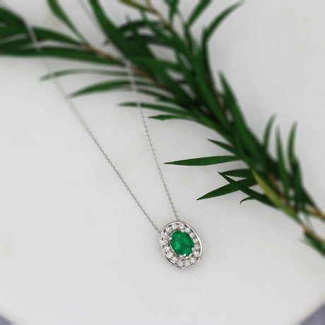 18ct White Gold Emerald and Diamond Halo Cluster Pendant