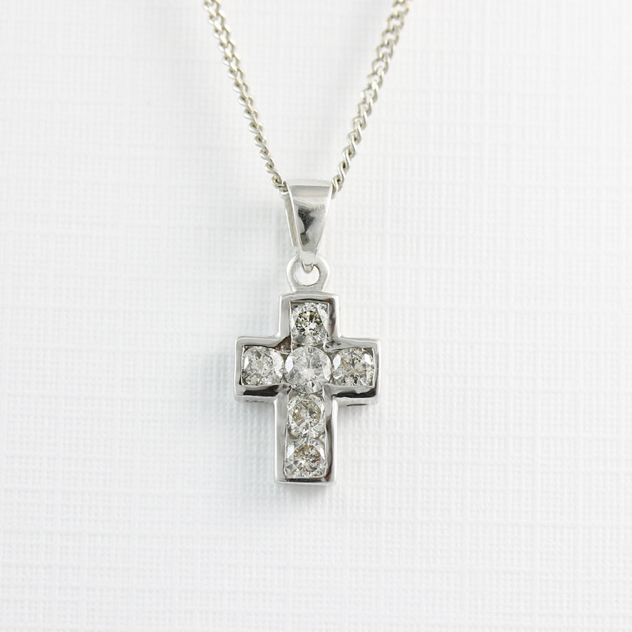 Cartier diamond 2025 cross pendant