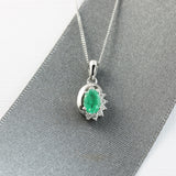 9ct White Gold Emerald & Diamond Pendant