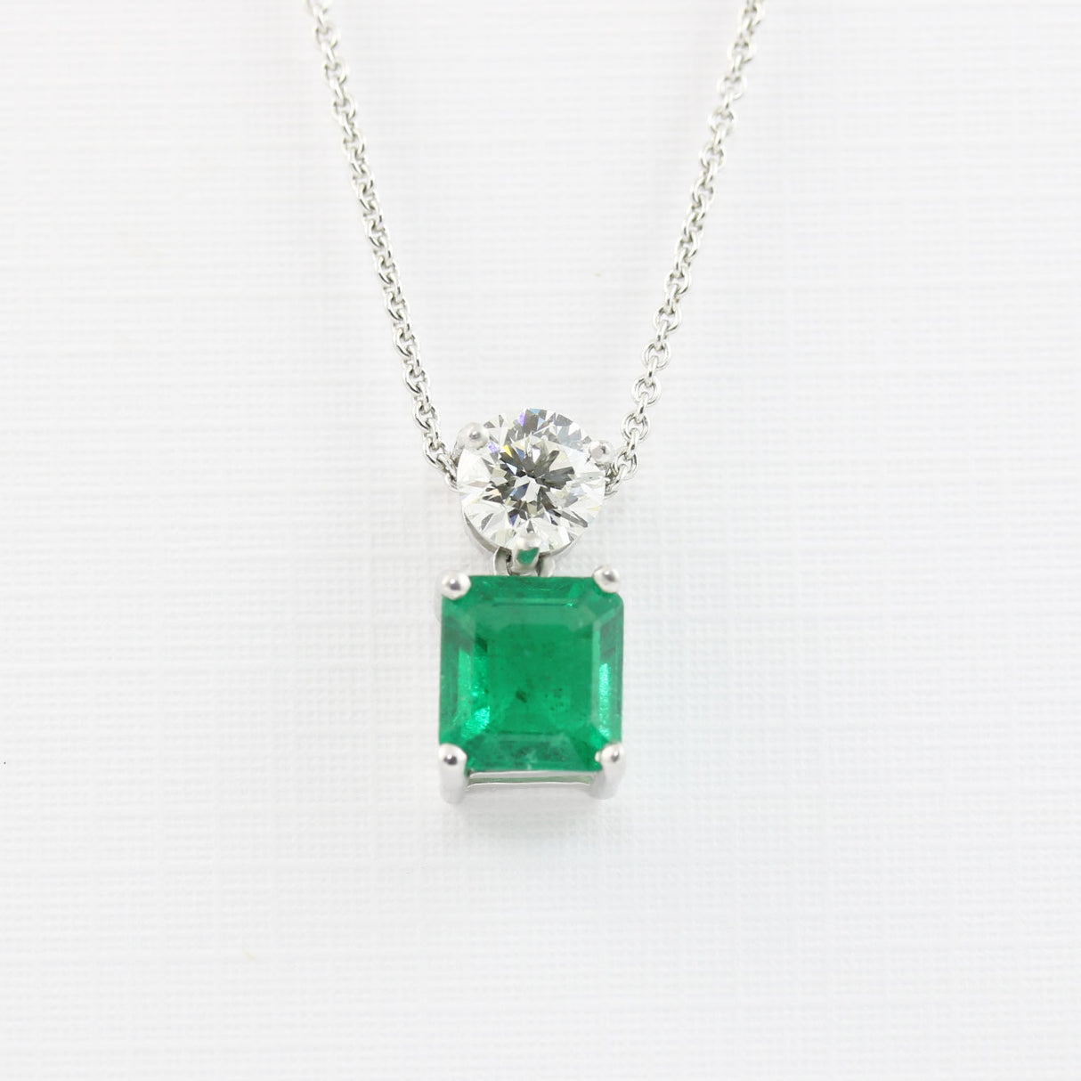 18ct White Gold Emerald & Diamond Pendant