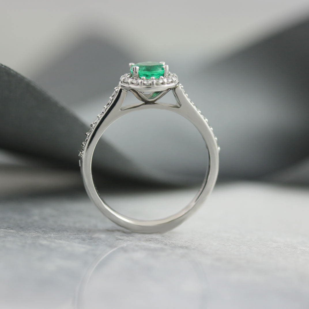 18ct White Gold Emerald & Diamond Halo Ring