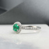 18ct White Gold Emerald & Diamond Halo Ring