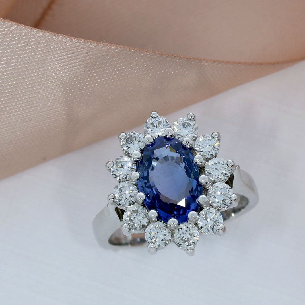 18ct White Gold Oval Sapphire & Diamond Cluster Ring