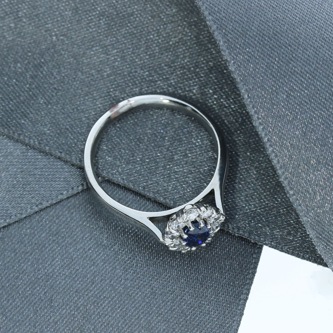 18ct White Gold Oval Sapphire and Diamond Halo Ring