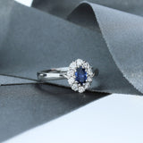 18ct White Gold Oval Sapphire and Diamond Halo Ring