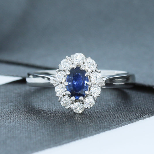 18ct White Gold Oval Sapphire and Diamond Halo Ring