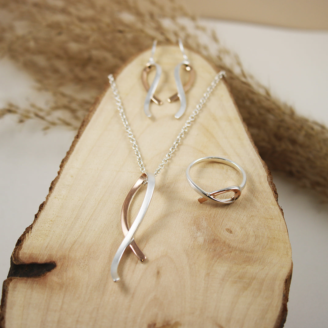 Silver Ribbon Style Pendant with Rose Gold Accent